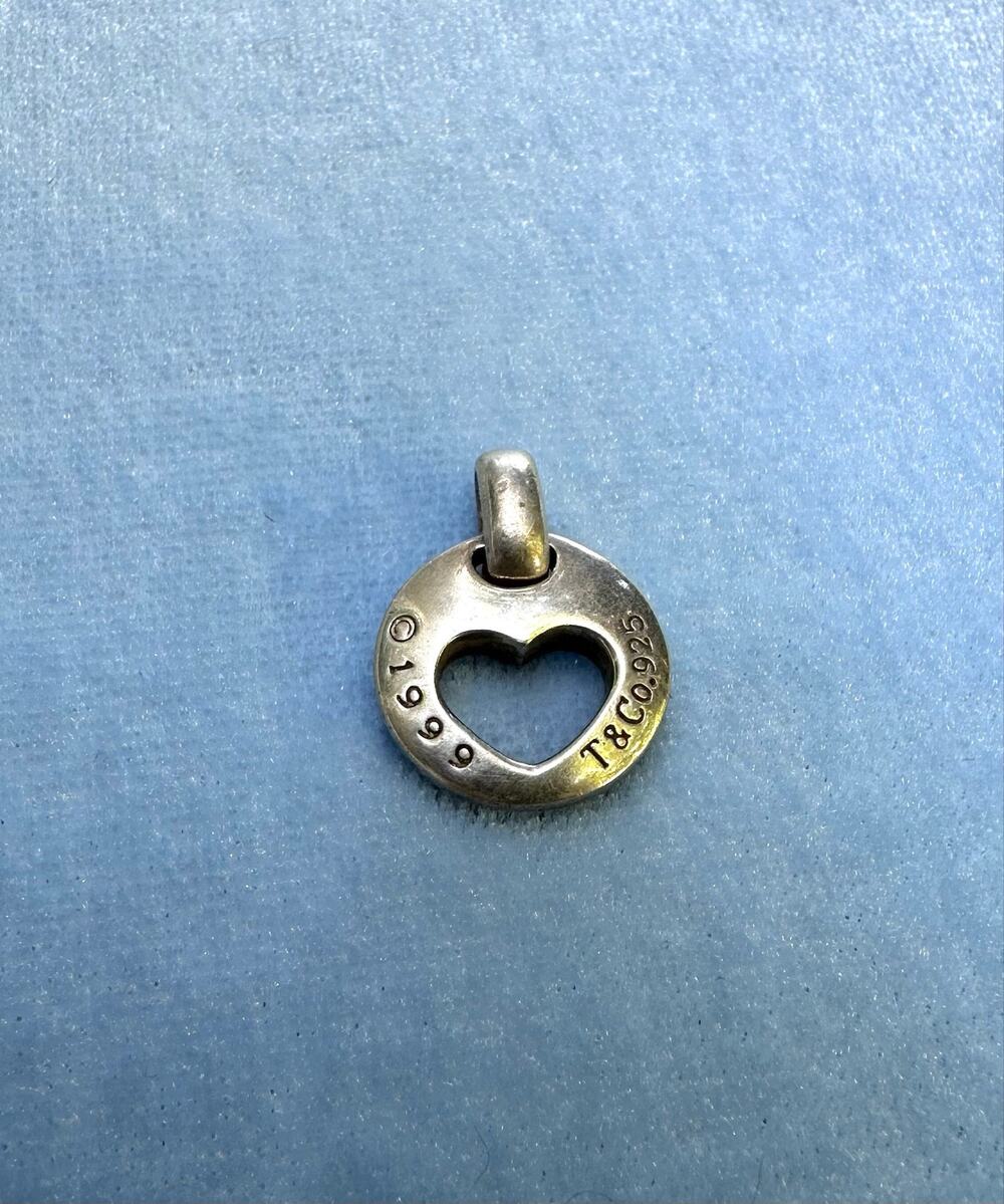 Tiffany & Co. 1999 Sterling Silver Cut Out Heart Disc Charm Pendant 925 Vintage